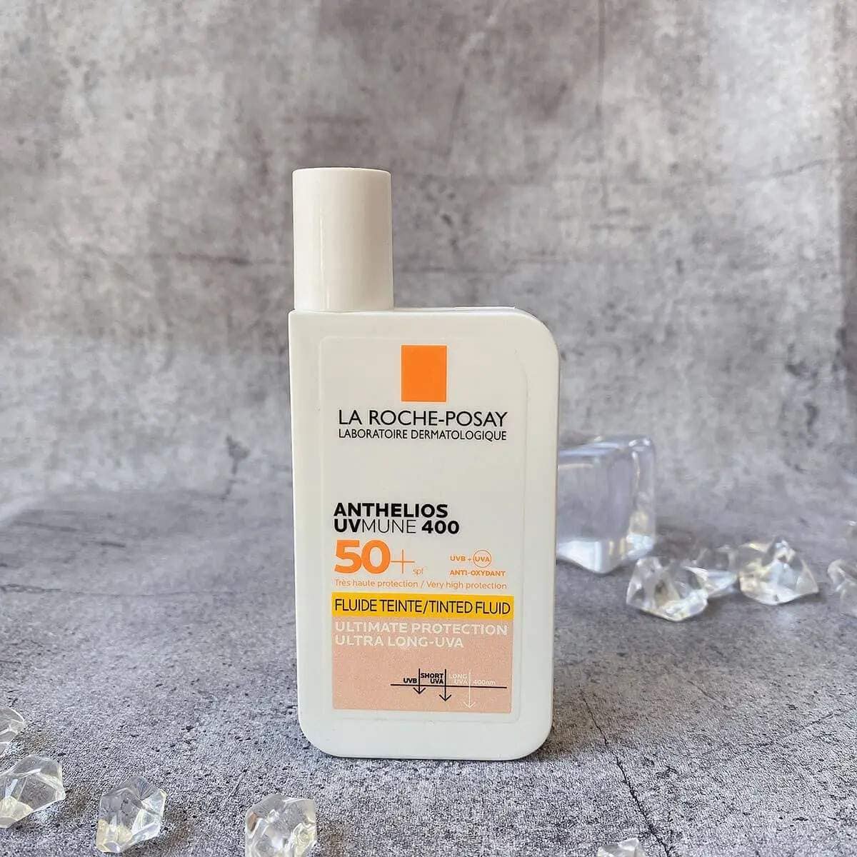 La Roche-Posay Anthelios UVMune 400 Tinted Fluid SPF50-1 واقي شمس سائل انثيليوس يو في مون 400 ملون من لاروش بوزييه - الصورة 1